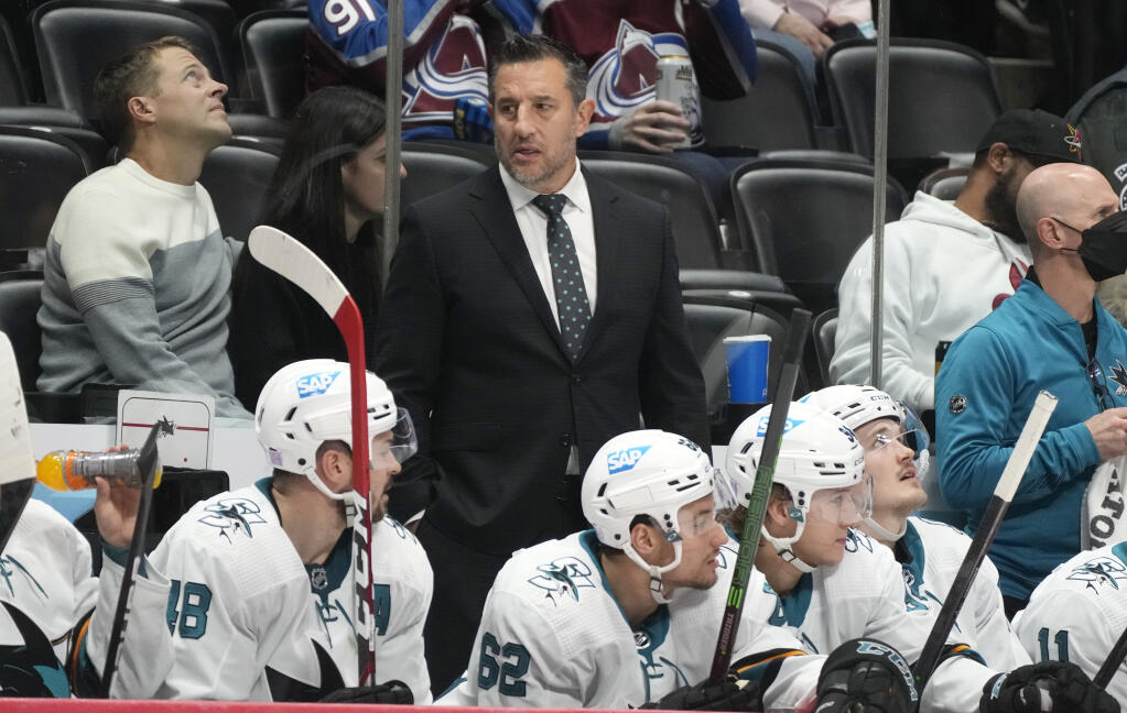 San Jose Sharks coach Bob Boughner watches from the bench during the second period against the Colorado Avalanche on Saturday, Nov. 13, 2021, in Denver. (David Zalubowski / ASSOCIATED PRESS)