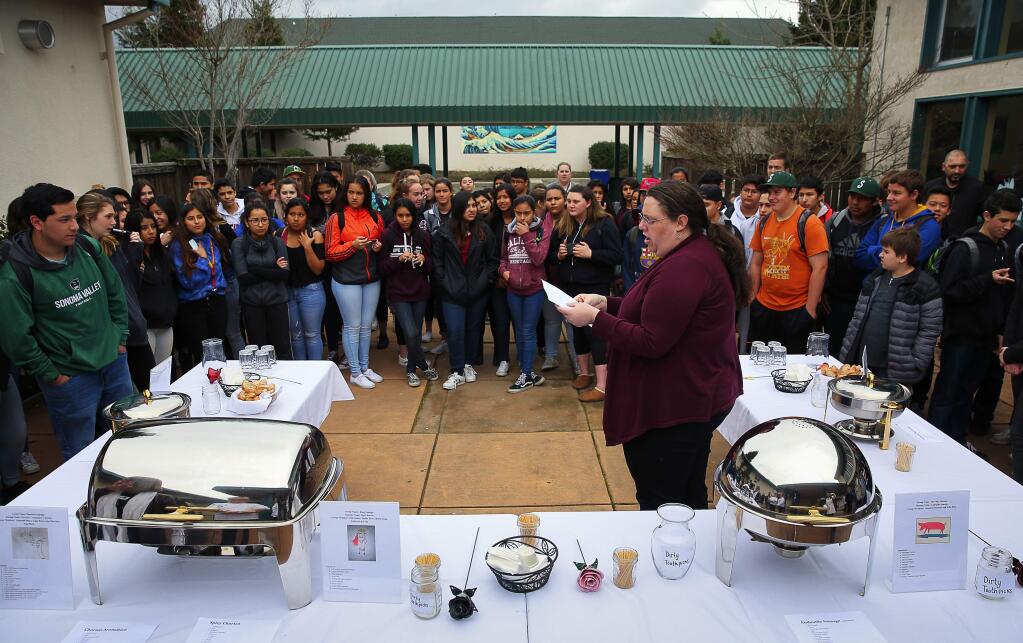 Veronica Gray, the English teacher for Team Fuji, introduces the community judges to her students for the sausage tasting at Sonoma Valley High School on Tuesday, March 7, 2017. (Christopher Chung/ The Press Democrat)