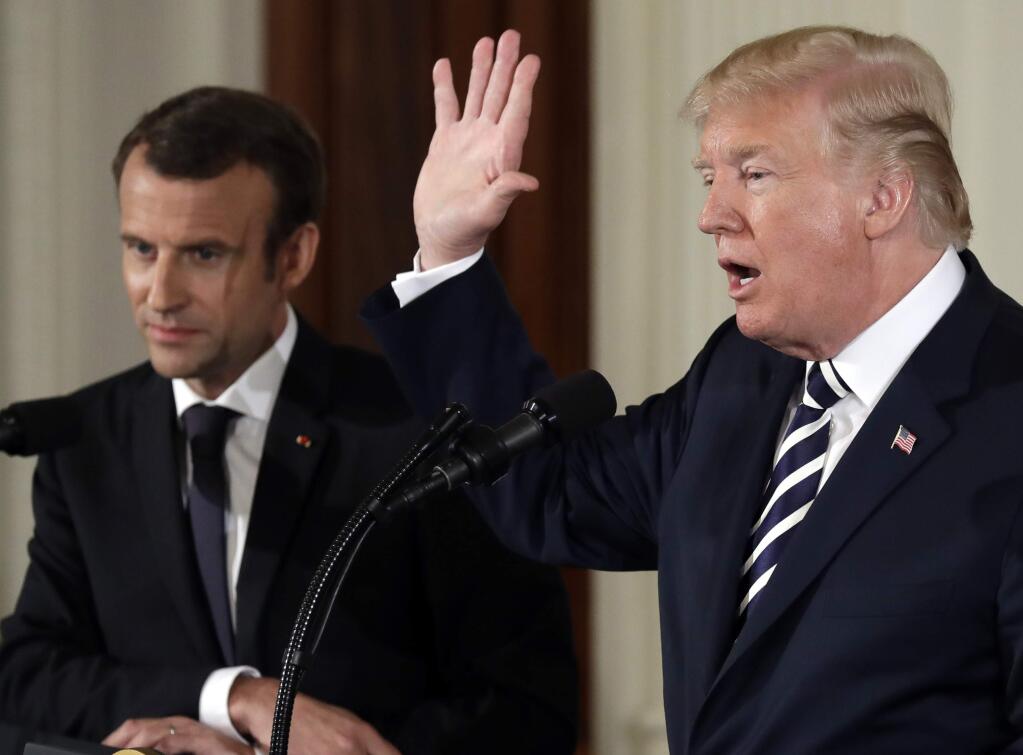 President Donald Trump speaks during a news conference with French President Emmanuel Macron in the East Room of the White House, Tuesday, April 24, 2018, in Washington. (AP Photo/Evan Vucci)