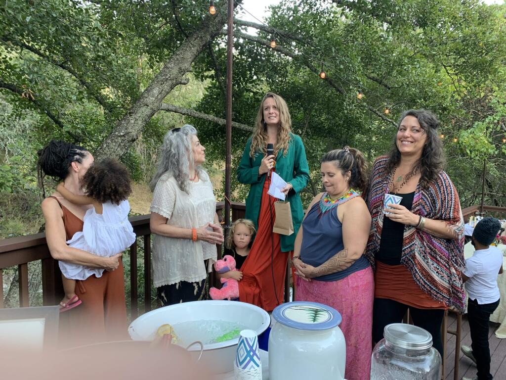 At the Creekside Healing Village opening event: Gianna Pla, Carol (prefers just Carol), Melinda Phoenix (and daughter underneath Ella), Rosie Medina and Ashraya Riggio.