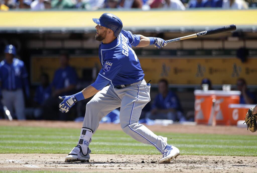 Kansas City Royals' Alex Gordon drives in a run with a single against the Oakland Athletics during the second inning of a baseball game, Sunday, April 17, 2016, in Oakland, Calif. (AP Photo/Marcio Jose Sanchez)