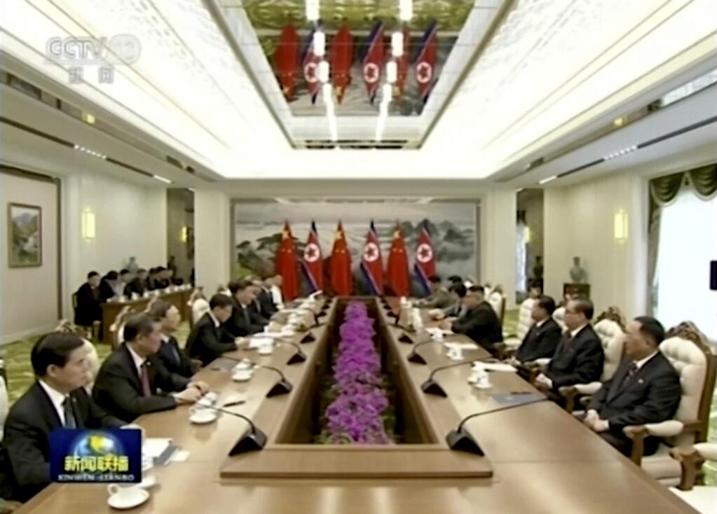 In this image taken from a video footage run by China's CCTV, Chinese President Xi Jinping and North Korean leader Kim Jong Un hold a talk in Pyongyang, North Korea, Thursday, June 20, 2019. Xi and Kim met in the North's capital on Thursday, their fifth meeting in 15 months, with stalled nuclear negotiations with Washington expected to be on the agenda. (CCTV via AP)