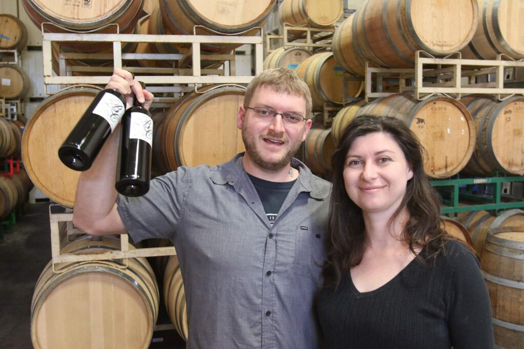Michael & Lorraine Barber in the winery where their wine is produced and stored in Santa Rosa on Tuesday, April 7, 2015. The Barbers are using a Kick Starter campaign to raise $20,000 to open a tasting room in Petaluma. (SCOTT MANCHESTER/ARGUS-COURIER STAFF)