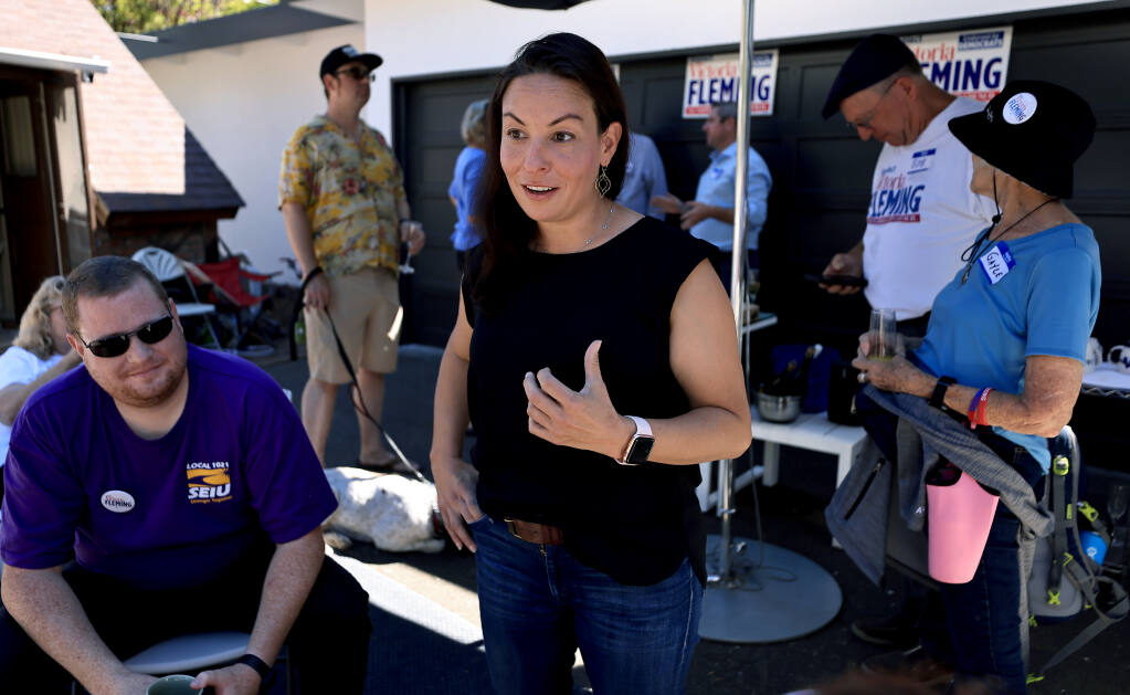 Santa Rosa Council member Victoria Fleming, the District 4 incumbent, meets with campaign volunteers, Saturday, Sept. 24, 2022 at her home after canvassing different neighborhoods in the district. (Kent Porter / The Press Democrat) 2022