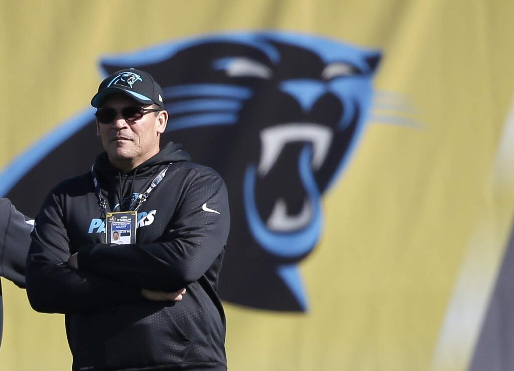 Carolina Panthers head coach Ron Rivera watches his team stretch during practice in preparation for Super Bowl 50, Friday Feb. 5, 2016 in San Jose. (AP Photo/Marcio Jose Sanchez)
