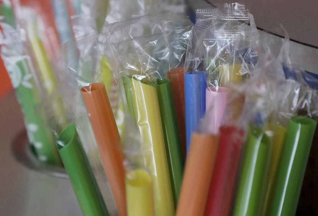 Wrapped plastic straws at a bubble tea cafe in San Francisco. California Gov. Jerry Brown on Thursday signed the nation's first state law barring dine-in restaurants from giving customers plastic straws unless they are requested (AP Photo/Jeff Chiu, File)