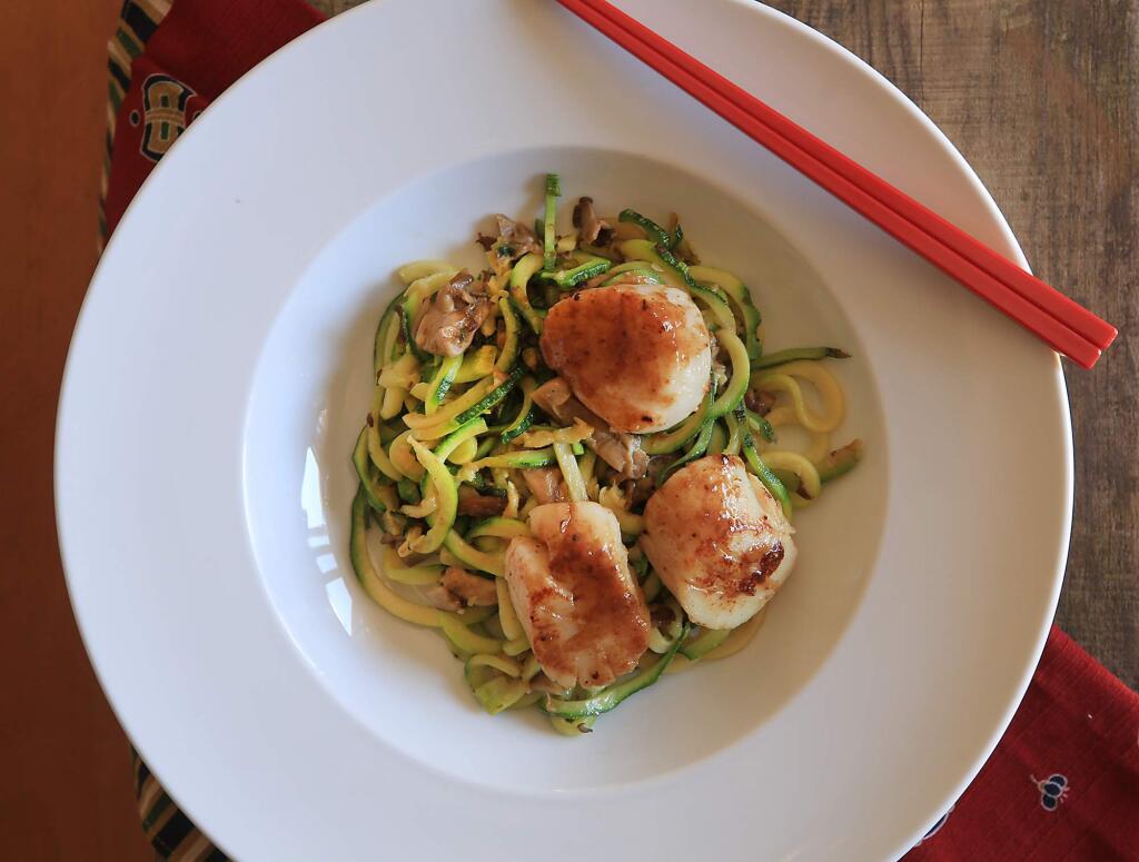 Photos by Kent Porter / Press DemocratMiso Glazed Scallops top off a dish of spiralized zucchini with mushrooms. Using one of the many brands of spiralizers on the market, you can turn vegetables into noodles, as a way to use up all those veggies taking up space in the fridge, while turning them into tasty, more healthful dishes for your family.