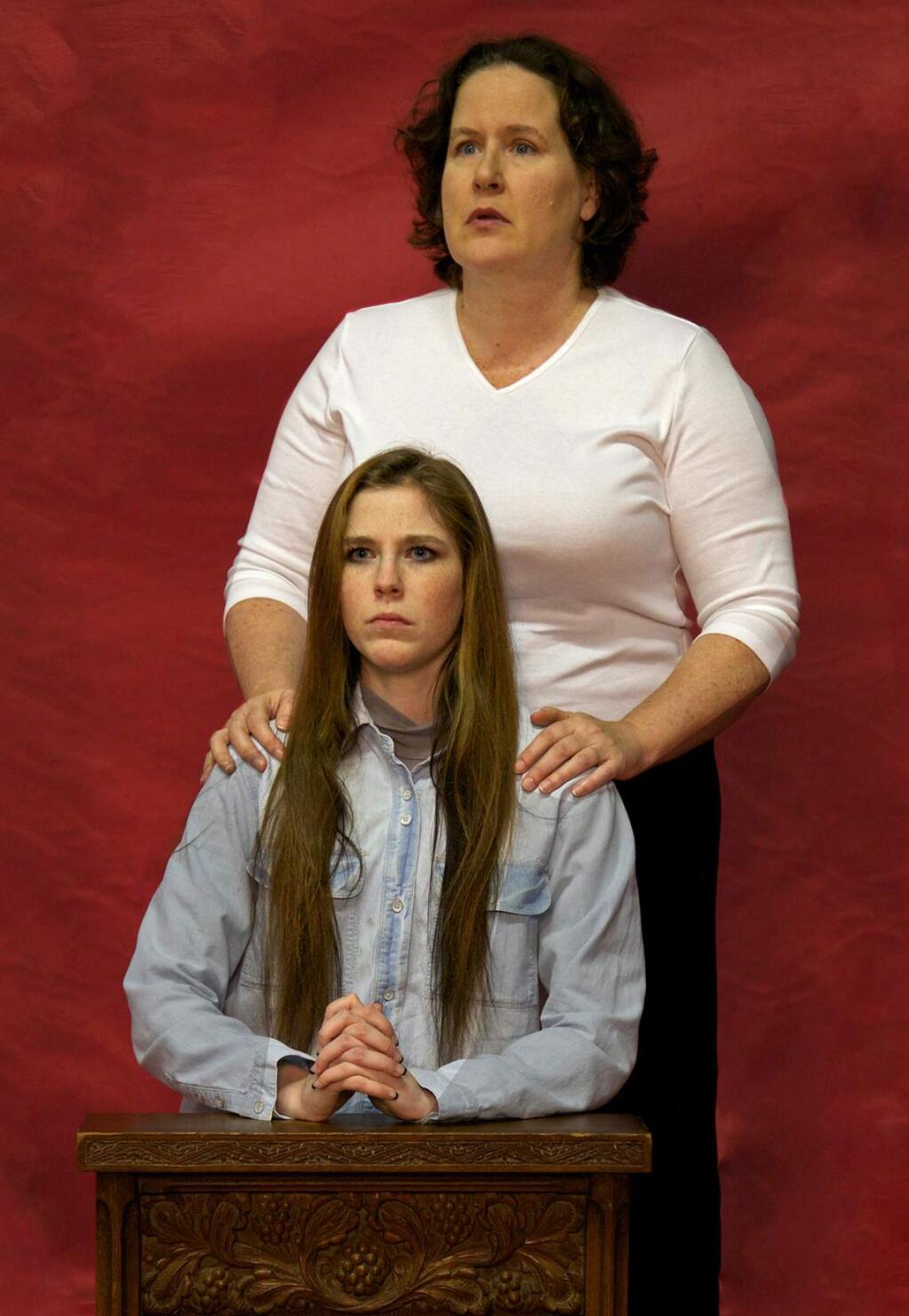 Submitted photoJill Wagoner (standing) as Margaret, and Emily Qvistgaard as Carrie White in STA/TNT's ‘Carrie:  The Musical,' at the Sonoma Community Center.