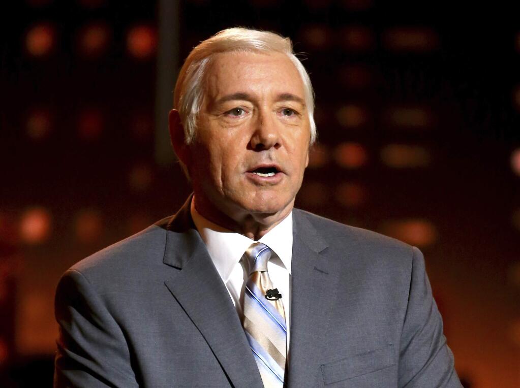 FILE - In this June 11, 2017, file photo, Kevin Spacey impersonates Johnny Carson at the 71st annual Tony Awards in New York. Spacey says he is “beyond horrified” by allegations that he made sexual advances on a teen boy in 1986. Spacey posted on Twitter that he does not remember the encounter but apologizes for the behavior. (Photo by Michael Zorn/Invision/AP, File)