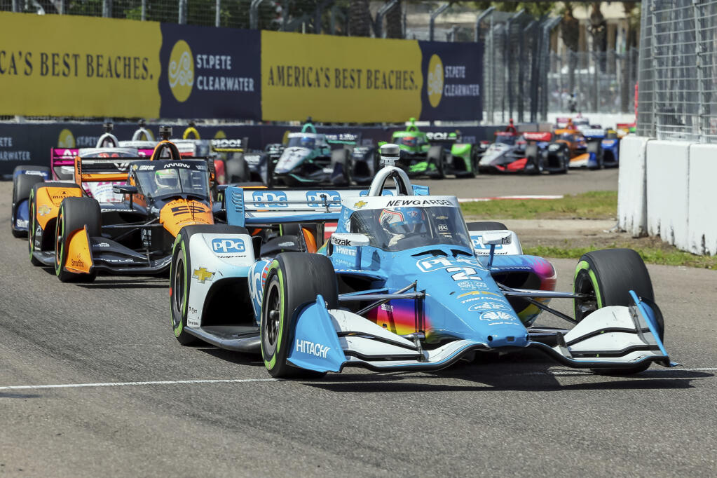 Team Penske driver Josef Newgarden leads coming out of Turn 12 during the IndyCar Grand Prix of St. Petersburg on March 10 in Florida. (Mike Carlson / ASSOCIATED PRESS)