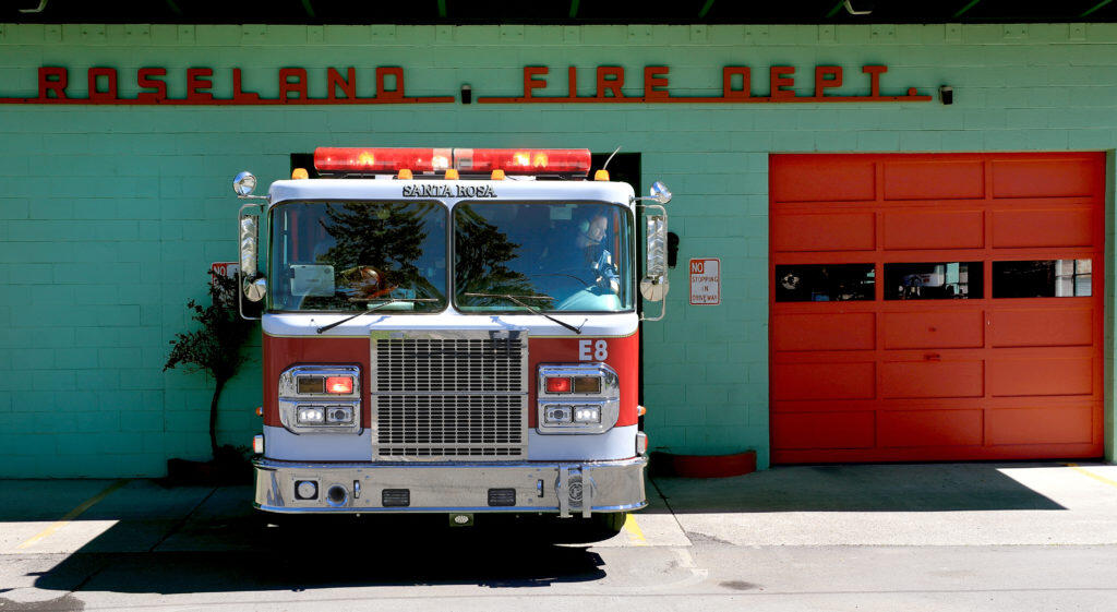 At the Roseland Fire Department, Santa Rosa’s station 8, Kevin Fleming pulls the engine out enroute to a medical aid in Roseland, Tuesday, April 9, 2019.  (Kent Porter / Press Democrat) 2019