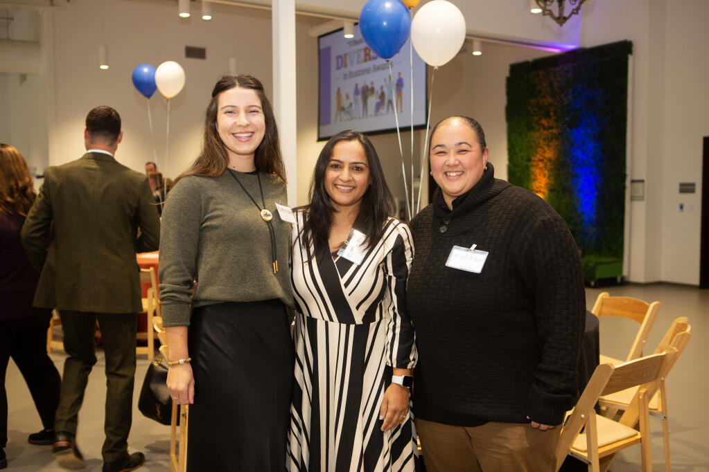 Lindsay Meehan, left, Ami Kundaria and Sherry Clark, all of MCE, attend North Bay Business Journal's Diversity in Business Awards held at The Backdrop venue at Becoming Independent's Santa Rosa headquarters on Wednesday, Oct. 25, 2023. (Charlie Gesell / for North Bay Business Journal)