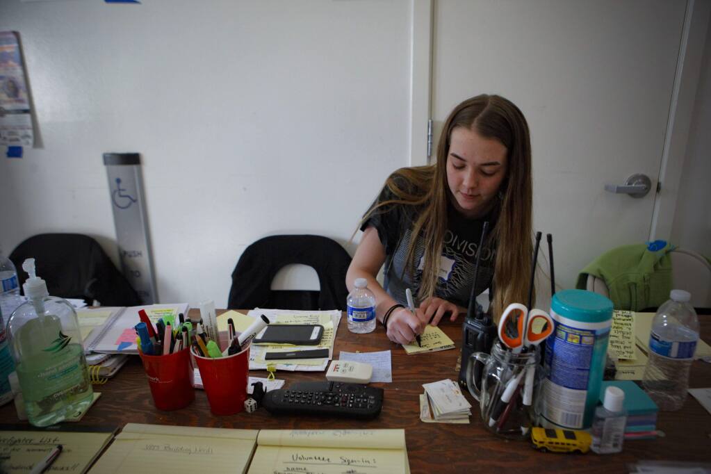 Petaluma, CA. Monday, October 16, 2017._ Paige , 15, a student at Petaluma HS volunteered at the Veterans Memorial Building which served as an evacuation shelter for those fleeing the wildfires. The teen took over the responsibility of coordinating the volunteers. (CRISSY PASCUAL/ARGUS-COURIER STAFF)