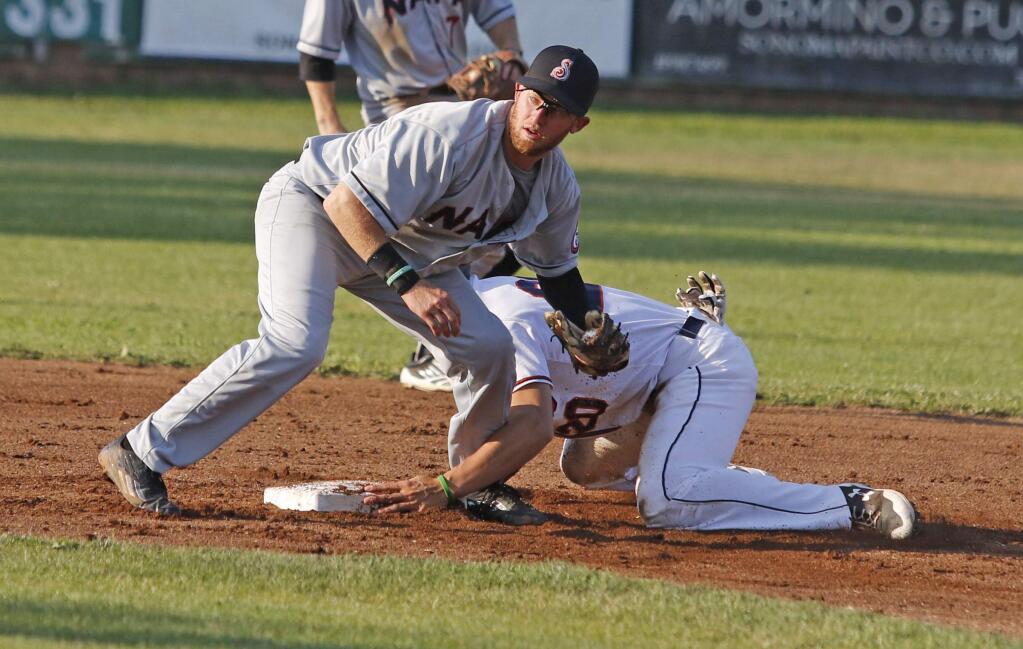Bill Hoban/Index-TribuneNapa second baseman Nick Gotta looks for a call after Sonoma Stomper Mitchell Ho stole second in Wednesday night's game. Ho was safe, but the Stompers dropped an 8-5 decision to the Silverados.