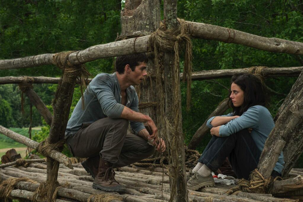 20th Century FoxDylan O'Brien as Thomas and Kaya Scodelario as Teresa Agnes, who are trapped in a glade at the center of a giant maze in 'The Maze Runner.'