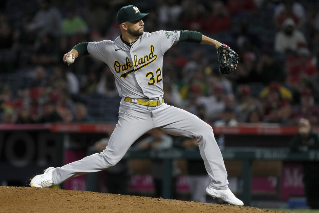Oakland A’s starting pitcher James Kaprielian winds up during the fifth inning against Los Angeles Angels in Anaheim on Saturday, Sept. 18, 2021. (Alex Gallardo / ASSOCIATED PRESS)