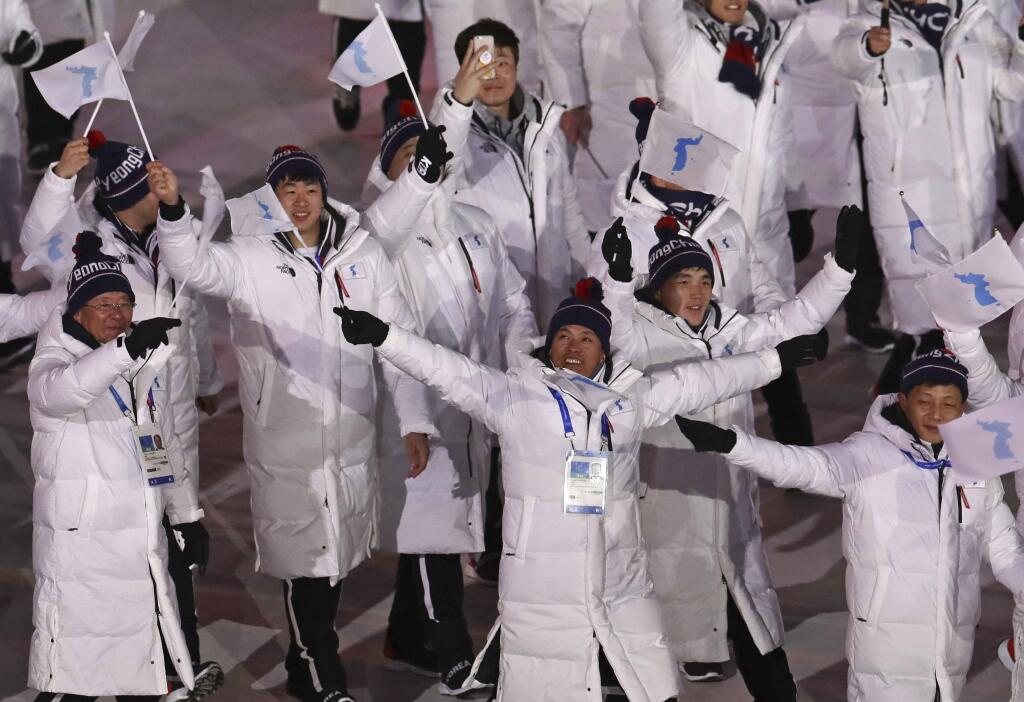 Korean athletes wave during the opening ceremony of the 2018 Winter Olympics in Pyeongchang, South Korea. (MICHAEL SOHN / Associated Press)