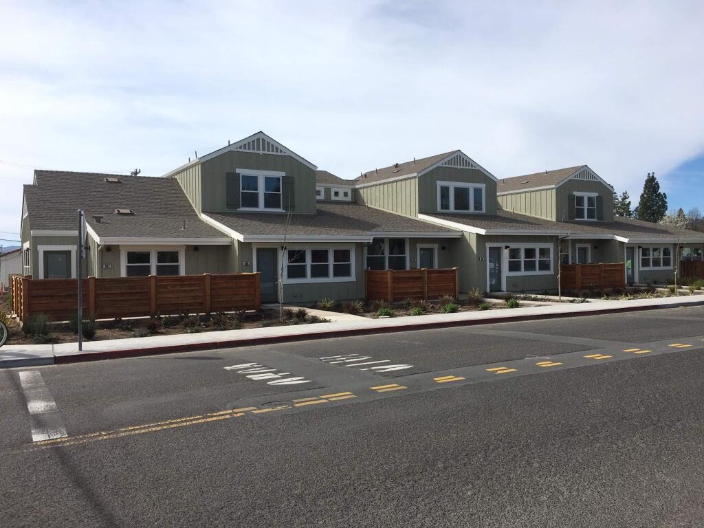 The completed townhouses on West Spain Street back up to the Sonoma Market complex.