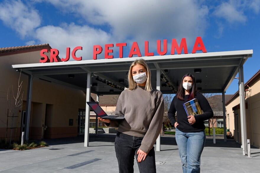 Students, wearing masks during the coronavirus pandemic, pose at the entrance to Santa Rosa Junior College’s Petaluma campus. (courtesy of SRJC)