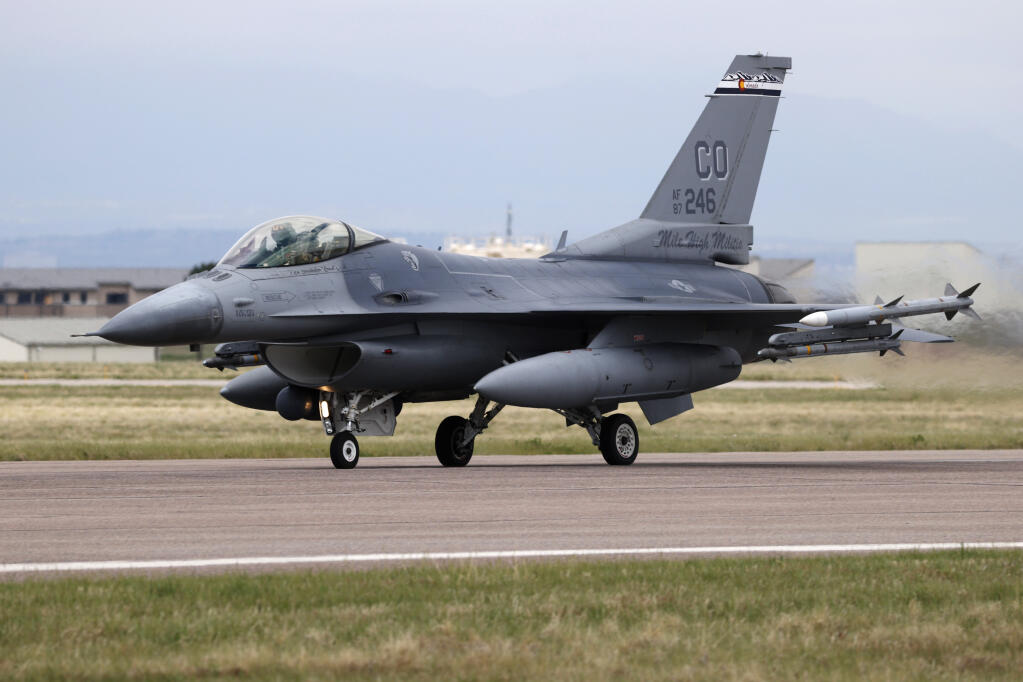 FILE - A F-16 Fighting Falcon from Colorado Air National Guard's 140th Wing takes off from Buckley Air Force Base as part of a second flyover to salute COVID-19 front-line workers May 15, 2020, in Aurora, Colo. President Joe Biden on Friday, May 19, 2023, endorsed plans to train Ukrainian pilots on U.S.-made F-16 fighter jets, according to two people familiar with the matter, as he huddled with allies at the Group of Seven summit on how to bolster support for Kyiv against Russia's invasion. (AP Photo/David Zalubowski, File)
