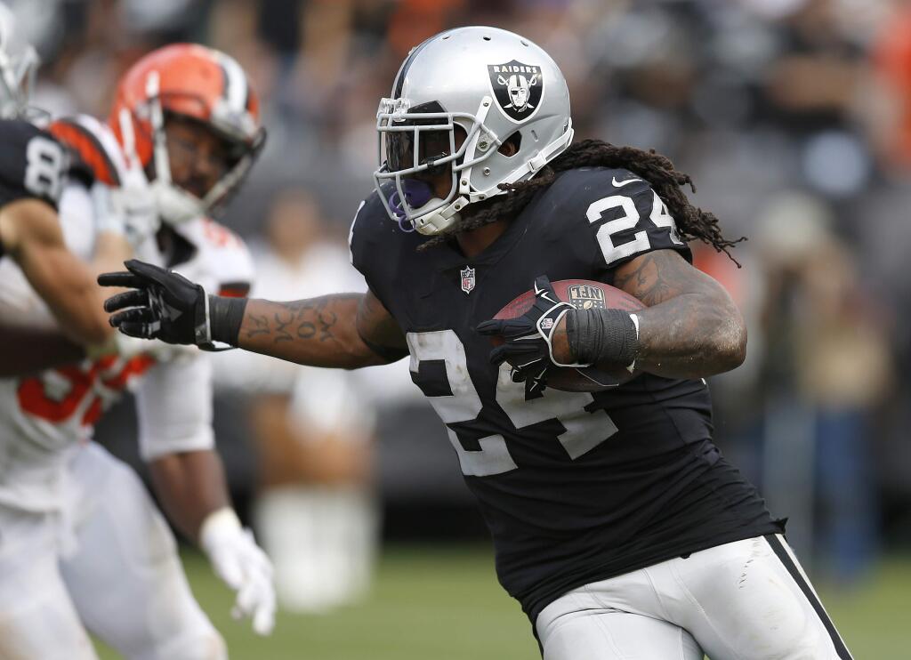 In this Sept. 30 2018, file photo, Oakland Raiders running back Marshawn Lynch carries against the Cleveland Browns in Oakland. (AP Photo/D. Ross Cameron, File)