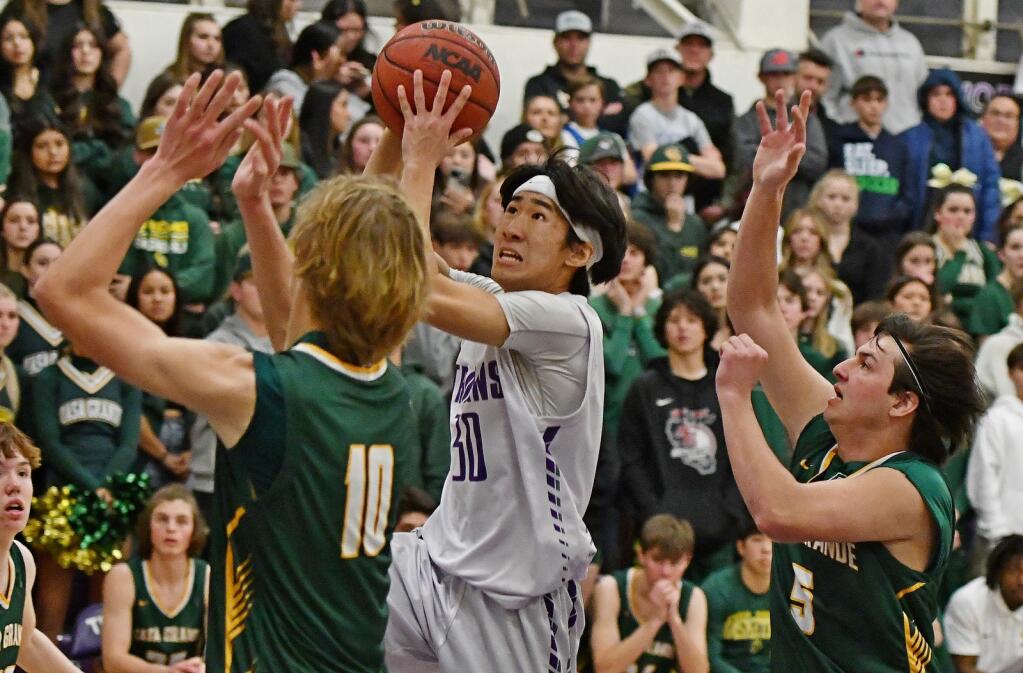 Andy Bai, shown in a game against Casa Grande, scored 21 points to lead Petaluma to a win over American Canyon in the Vine Valley Athletic League Tournament. (Sumner Fowler / For the Argus-Courier)