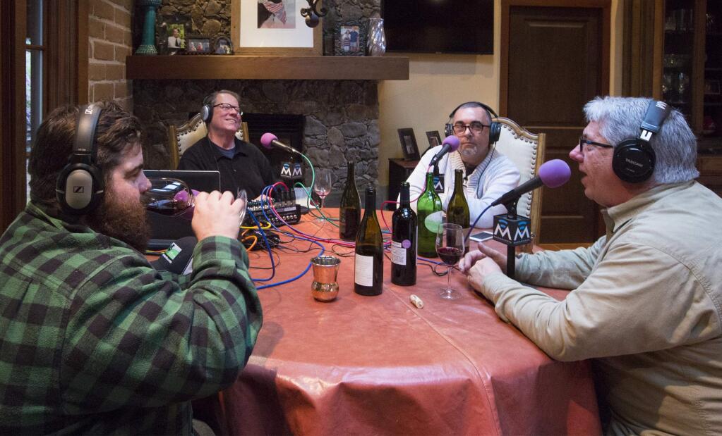 A bunch of guys who get together to share their thoughts on wine via podcast. Clockwise from left: Sam Coturri, John Myers, Brian Casey, and Bart Hansen. (Photo by Robbi Pengelly/Index-Tribune)