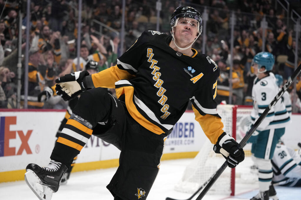 The Penguins’ Evgeni Malkin celebrates after his goal during the second period against the San Jose Sharks in Pittsburgh, Thursday, March 14, 2024. (Gene J. Puskar / ASSOCIATED PRESS)