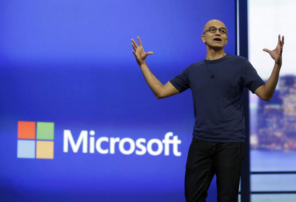 In this April 2, 2014 file photo, Microsoft CEO Satya Nadella gestures during the keynote address of the Build Conference in San Francisco. The company is skipping version 9 to emphasize advances it is making toward a world centered on mobile devices and Internet services. (AP Photo/Eric Risberg, File)
