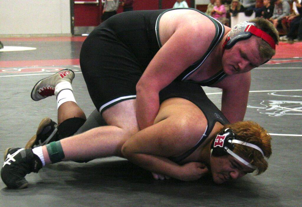 Steven Serafini/Index-TribuneSonoma's Dalton Elster (top) pins his opponent en route to capturing his second straight SCL heavyweight title during Saturday's SCL championship finals in Healdsburg.