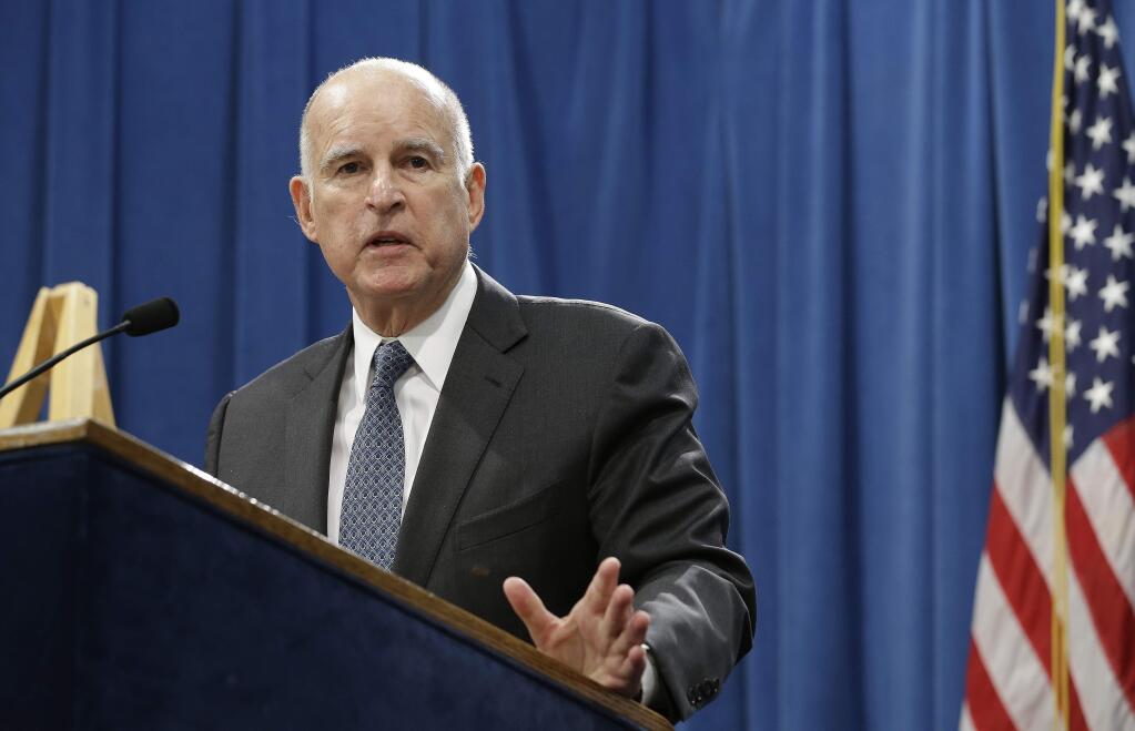 FILE--In this Jan. 10, 2017, file photo, California Gov. Jerry Brown discusses his 2017-2018 state budget plan in Sacramento, Calif. Brown's administration miscalculated costs for the state Medi-Cal program by $1.9 billion last year, an oversight that contributed to Brown's projection of a deficit in the upcoming budget, officials have acknowledged.(AP Photo/Rich Pedroncelli, file)
