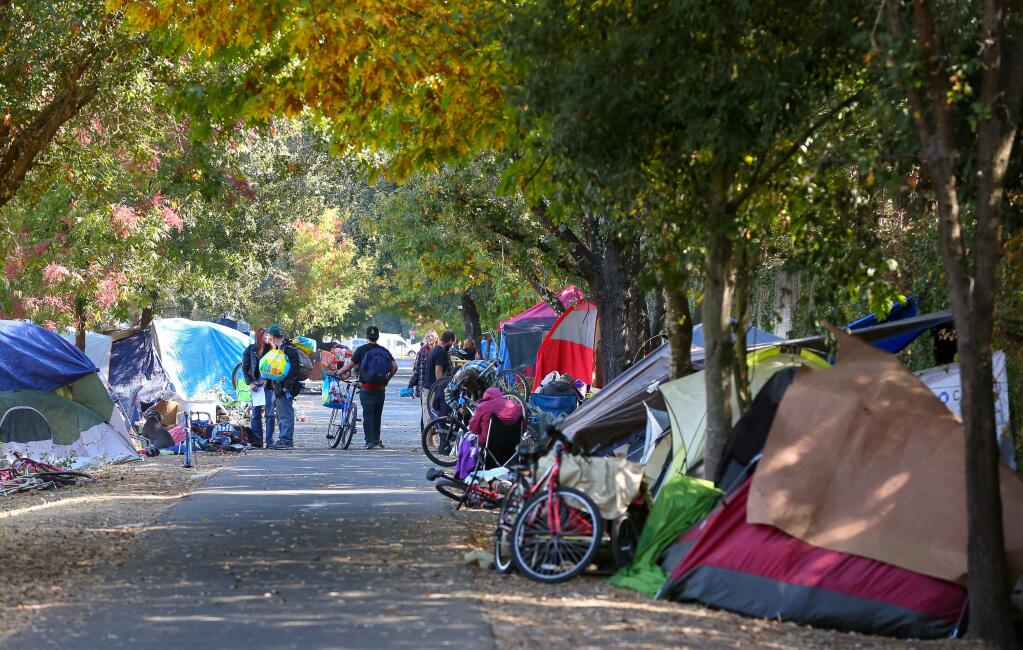 A PATH CHANGES: The Joe Rodota Trail has been in the news, with homeless encampments lining the trail. But who was Joe Rodota? CHRISTOPHER CHUNG / The Press Democrat)