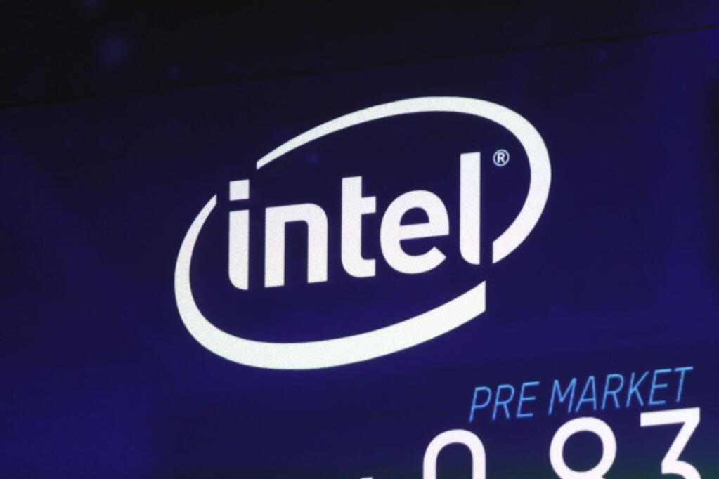 FILE - In this Oct. 3, 2018, file photo the Intel logo appears on a screen at the Nasdaq MarketSite, in New York's Times Square. Intel has revealed another hardware security flaw that could affects millions of machines around the world. The chipmaker said Tuesday, May 14, 2019, that there's no evidence of bad actors exploiting the bug, which is embedded in the architecture of computer hardware. (AP Photo/Richard Drew, File)