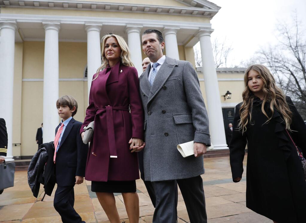 FILE - In this Jan. 20, 2017 file photo, Donald Trump Jr., wife Vanessa Trump, and their children Donald Trump III, left, and Kai Trump, right, walk out together after attending church service at St. John's Episcopal Church across from the White House in Washington. A public court record filed Thursday, March 15, 2018 in New York says Vanessa Trump is seeking an uncontested divorce from the president's son. Details of the divorce complaint haven't been made public. (AP Photo/Pablo Martinez Monsivais, File)