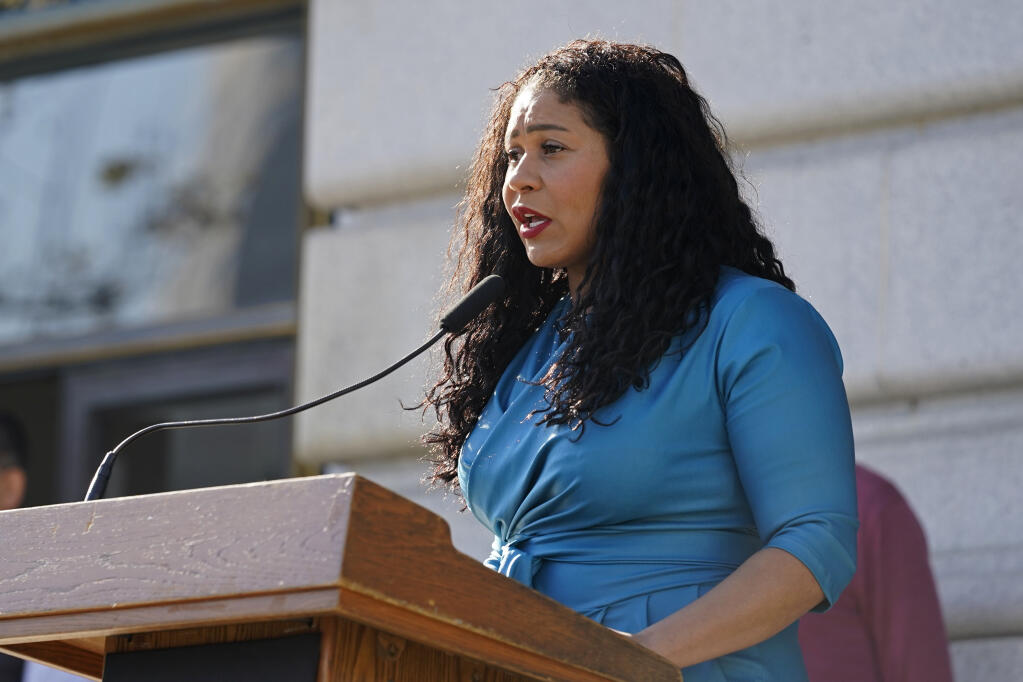 FILE - San Francisco Mayor London Breed talks during a briefing outside City Hall in San Francisco on Dec. 1, 2021.  The San Francisco Board of Supervisors approved an emergency order the mayor wants to tackle an opioid epidemic in its troubled Tenderloin district.  (AP Photo/Eric Risberg, File)