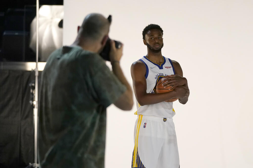 Golden State Warriors forward Andrew Wiggins poses for a photographer during the team’s media day in San Francisco on Monday, Sept. 27, 2021. (Jeff Chiu / ASSOCIATED PRESS)