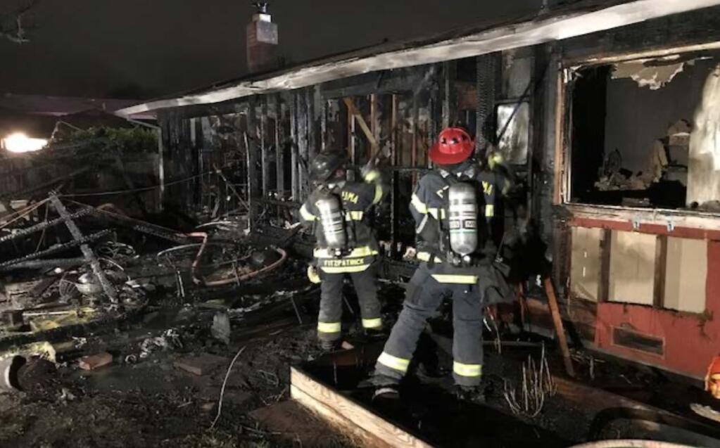 Firefighters extinguish a house fire in Petaluma on Thursday night, May 26, 2022. (Petaluma Fire Department)