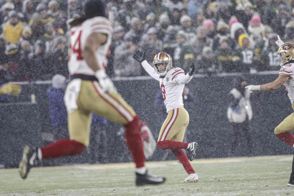 San Francisco 49ers kicker Robbie Gould (9) reacts after kicking the game-winning field goal as time expires against the Green Bay Packers during an NFL divisional playoff football game, Saturday, Jan 22.,. 2022, in Green Bay, Wis. (AP Photo/Jeffrey Phelps)