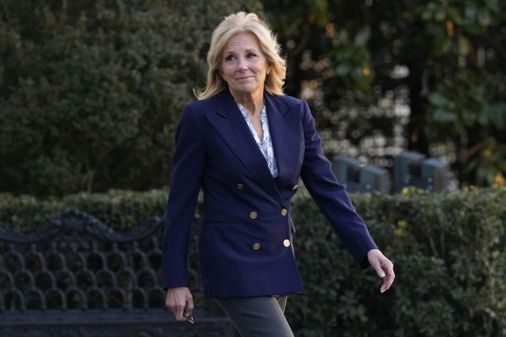 First lady Jill Biden walks out of the White House in Washington, Wednesday, Jan. 11, 2023, as she and President Joe Biden prepare to board Marine One. Jill Biden is having surgery to remove a small lesion found above her right eye during a routine skin cancer screening (AP Photo/Susan Walsh)