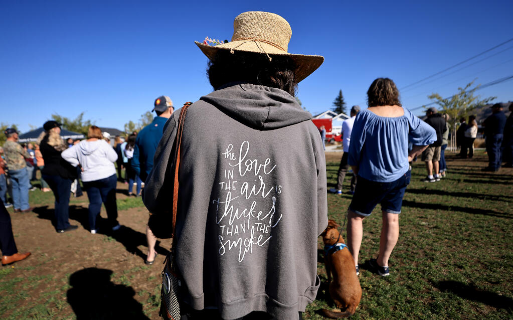 Kathy Harris from Sebastopol attends the five year anniversary remembrance of the Tubbs Fire Saturday, Oct. 8, 2022, at Coffey Park in Santa Rosa. Harris was the principal at Schaefer Elementary School in the heart of Coffey Park in 2017 when the Tubbs Fire took out most of her students homes. (Kent Porter / The Press Democrat) 2022