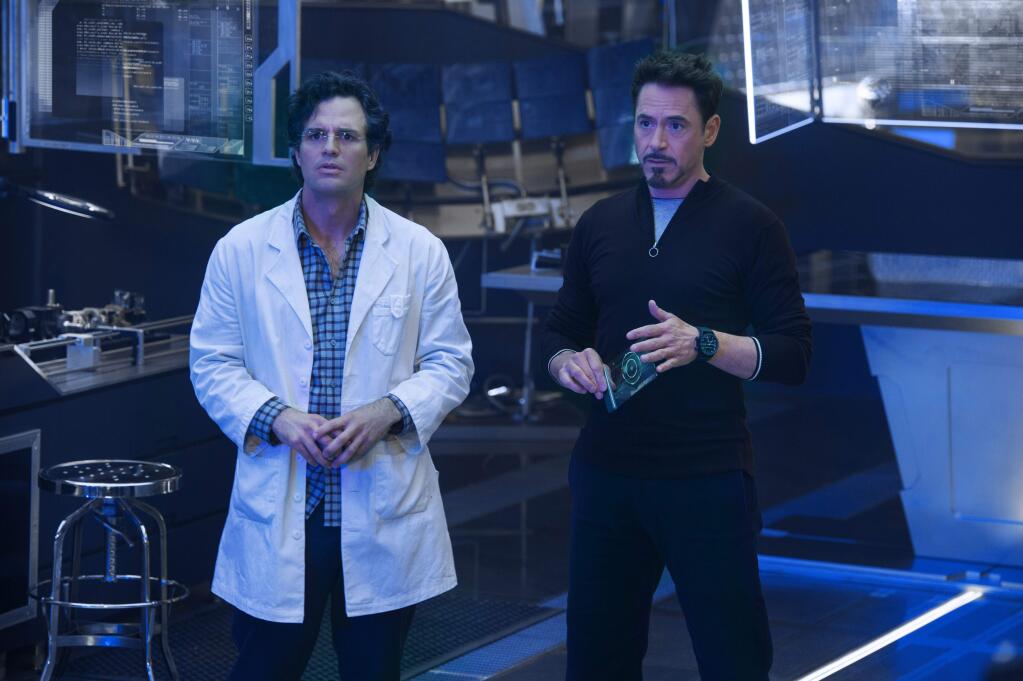 This photo released by Marvel shows, Mark Ruffalo, left, as Bruce Banner/Hulk and Robert Downey Jr. as Tony Stark/Iron Man, in a scene from Marvel's 'Avengers: Age of Ultron.' The film releases in the U.S. on May 1, 2015. (AP Photo/Marvel, Jay Maidment)