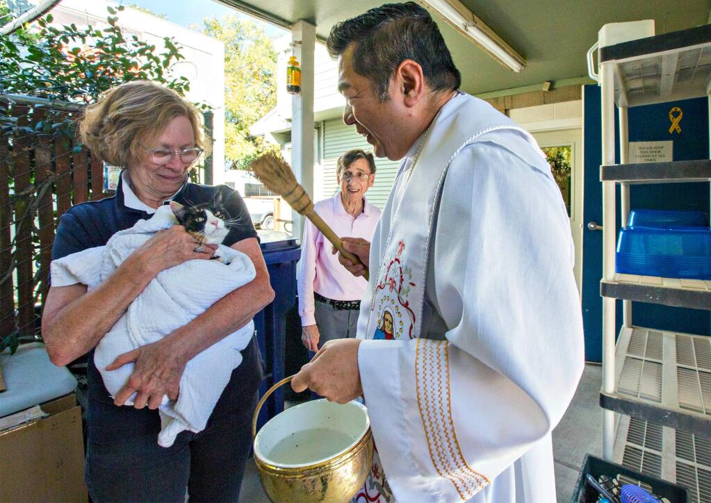 The feast of St. Francis of Assisi, the patron saint of animals, is celebrated on October 4. So on Wednesday, Father Alvin, from St. Francis Solano Catholic Church, blessed the beloved pets of around a dozen locals who came to Pets Lifeline with their critters in tow. Father Alvin then toured the buildings and blessed every animal currently living at the sanctuary. (Photo by Robbi Pengelly/Index-Tribune)
