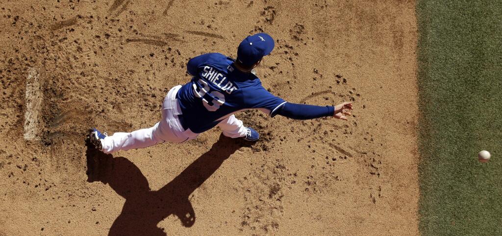 Kansas City Royals starting pitcher James Shields throws in the bullpen during practice Saturday, Oct. 18, 2014, in Kansas City, Mo. The Royals will host the San Francisco Giants in Game 1 of the World Series on Oct. 21. (AP Photo/Charlie Riedel)