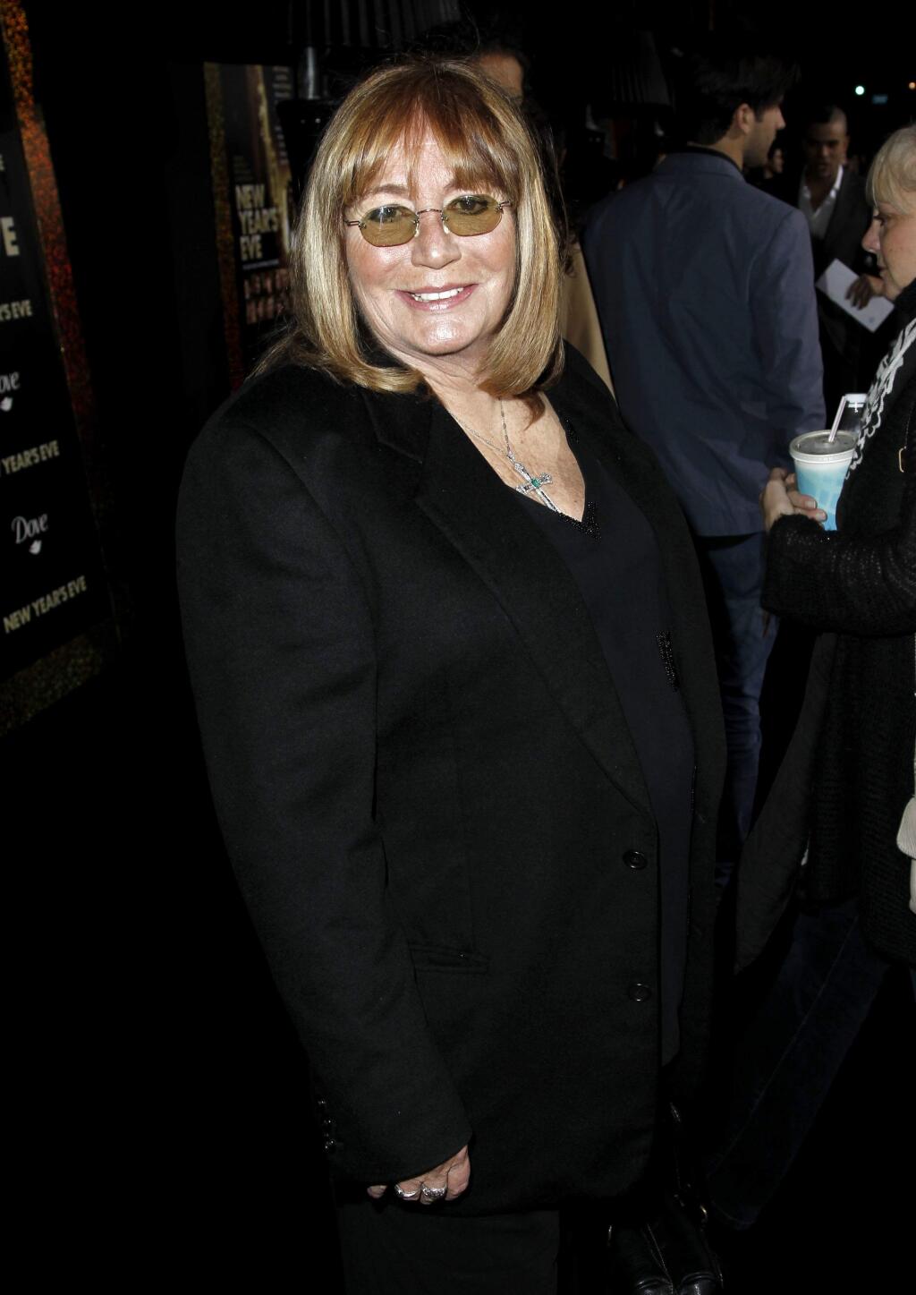 FILE - In this Dec. 5, 2011 file photo, Penny Marshall arrives at the premiere of 'New Year's Eve' in Los Angeles. Marshall died of complications from diabetes on Monday, Dec. 17, 2018, at her Hollywood Hills home. She was 75. (AP Photo/Matt Sayles, File)