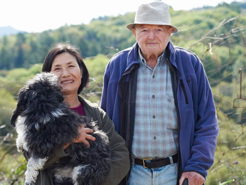 Art and Suiko Grant with their dog, Lulu (family photo)