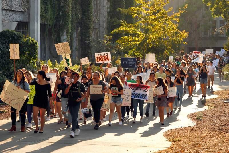 Students and other demonstrations marched around the Sonoma State University campus in this Sept. 5 file photograph protesting the Trump administration rescinding the Delayed Action for Childhood Arrivals program. (Alvin Jornada/The Press Democrat)
