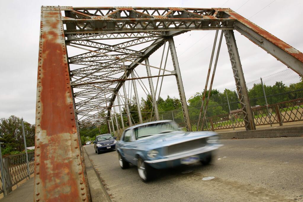 A car on the Healdsburg Memorial Bridge before it was closed to undergo a seismic retrofit and rehab. (Conner Jay/The Press Democrat)