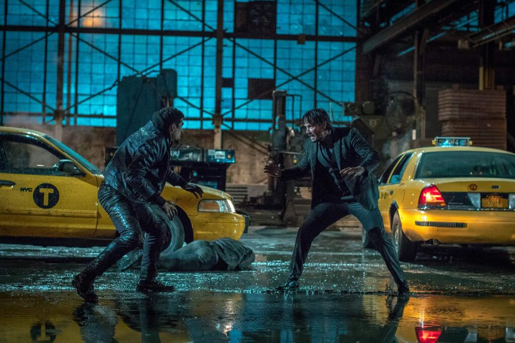 SUMMIT ENTERTAINMENTKeanu Reeves, right, returns as hitman John Wick, who has to battle an assassin's guild in 'John Wick: Chapter 2.'