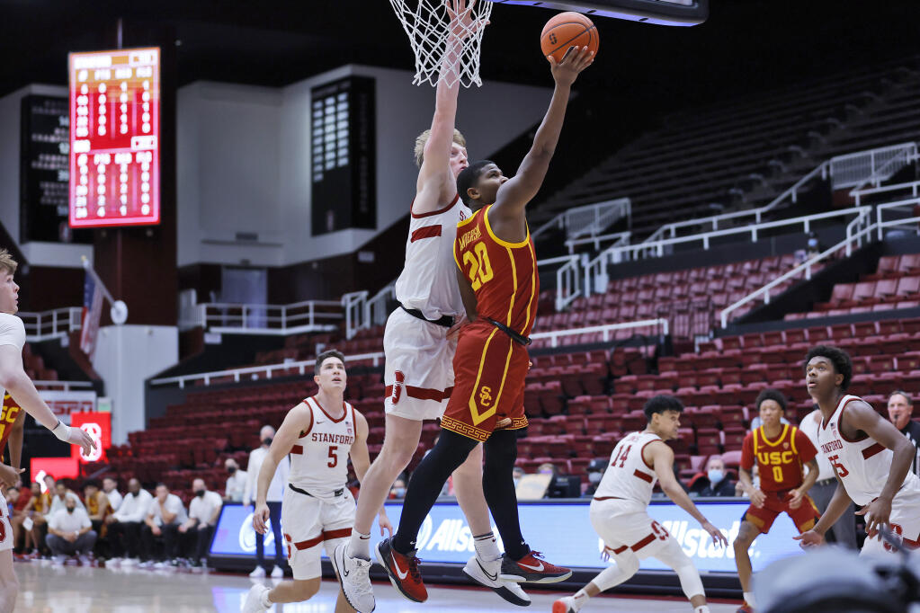 Stanford forward James Keefe, left, defends as USC guard Ethan Anderson aims for the basket during the first half on Tuesday, Jan. 11, 2022, in Stanford. (Josie Lepe / ASSOCIATED PRESS)