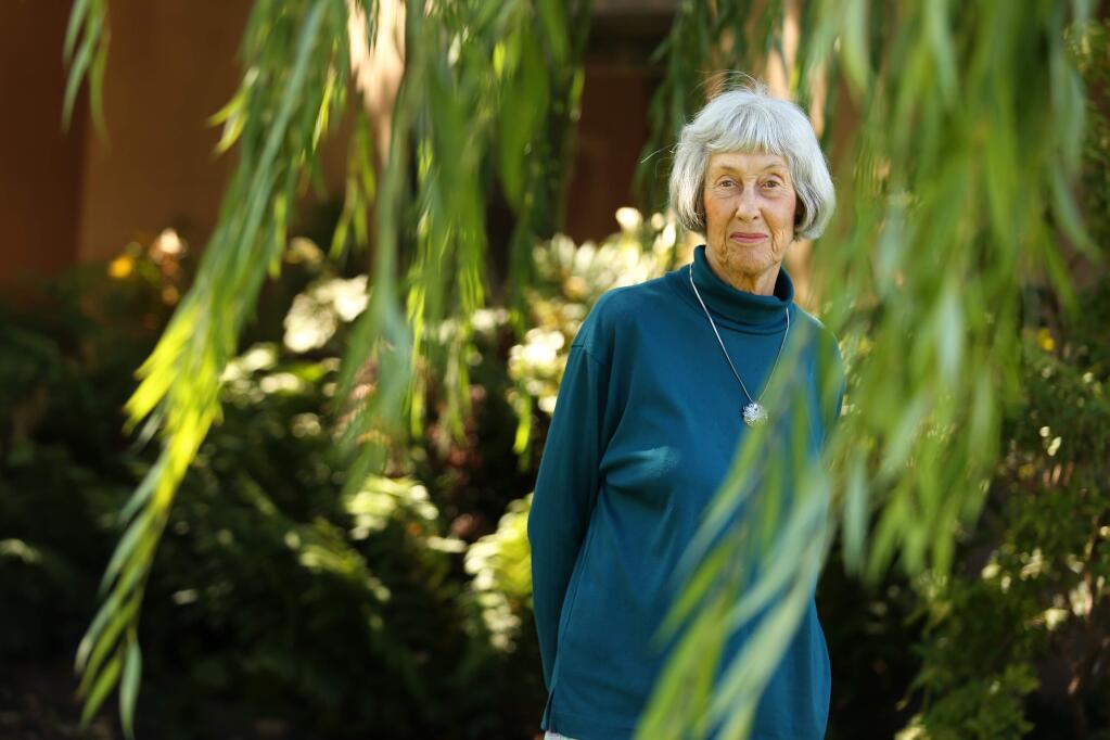 Ruth Paine stands by the willow tree by her home at the Friends House in Santa Rosa on Thursday, September 5, 2013. Paine had Lee Harvey Oswald's wife and children living at her home in Dallas at the time of John F. Kennedy's assassination. (Conner Jay/The Press Democrat)